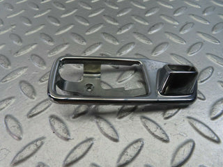 W123 chrome frame for door opener left used OEM