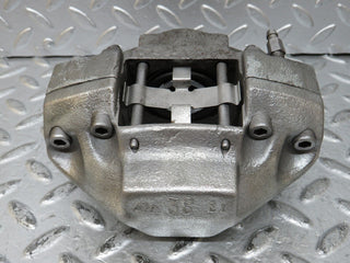 W116 rear left brake caliper used OEM