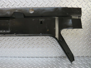 W124 trunk lock trim panel used OEM