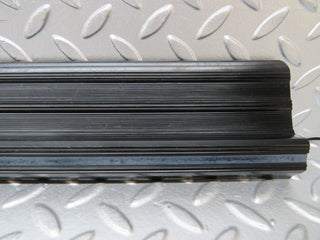 W123 front left door sill trim black used OEM