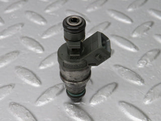 W124 Cabriolet fuel injector used OEM
