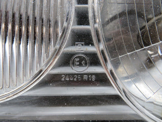 W123 headlight left side used OEM
