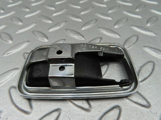 W123 chrome frame for door opener left used OEM