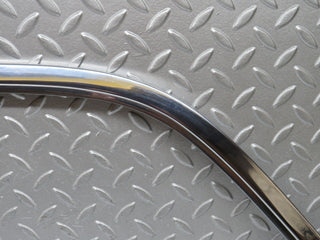 W109 rear left door chrome window frame used OEM