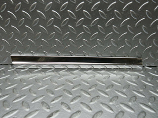 R107 SLC rear left window chrome trim used OEM