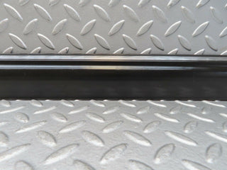 W123 front left door lower trim used OEM
