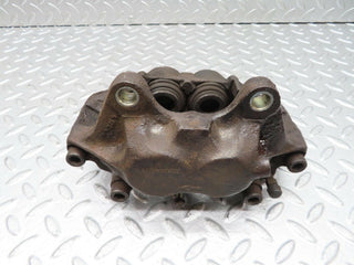 W140 front brake caliper left side used OEM