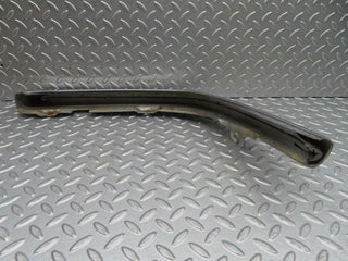 W116 front right upper bumper corner used OEM