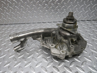 W124 water pump used OEM
