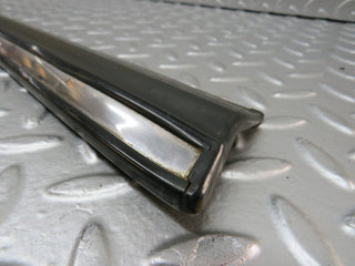 W123 front left door lower moulding trim used OEM