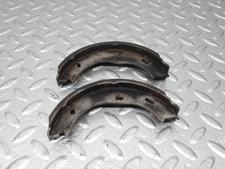 W123 rear brake shoes set right side used OEM