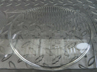 W123 headlight lens left used OEM