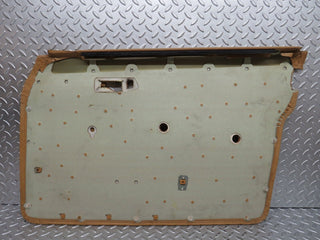 W123 front left door card beige used OEM