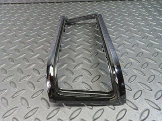 W115 tail light chrome frame left used OEM