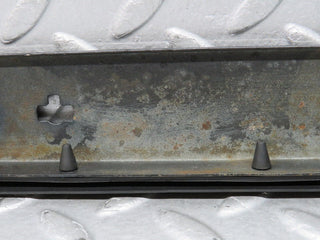 W124 Cabriolet under headlight trim left used OEM