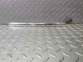 W123 rear left door chrome window channel used OEM
