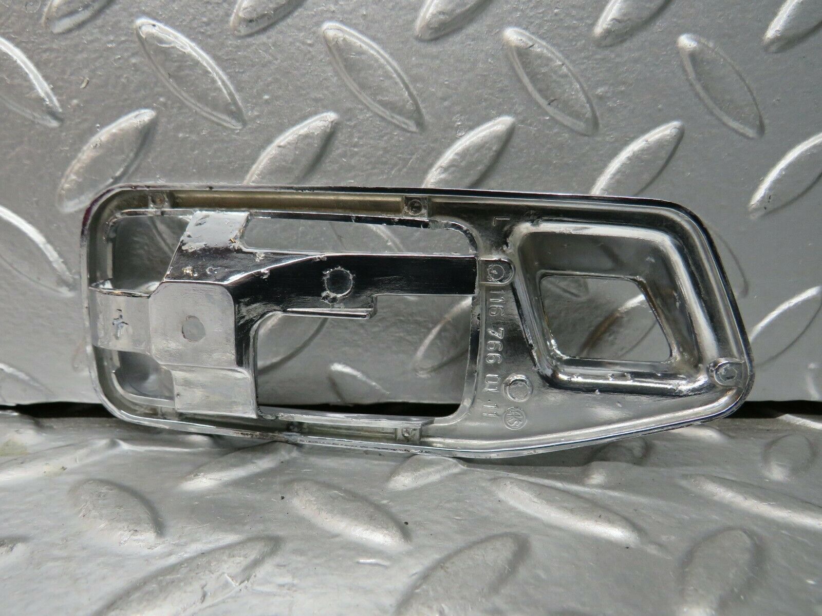 23262 Mercedes-Benz W116 350SE Left Door Handle Surround 1087660111