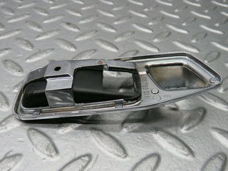 W123 Wagon door opener chrome frame left used OEM