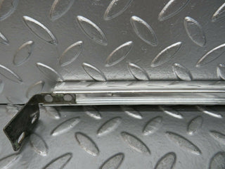 W108 rear left chrome window channel used OEM