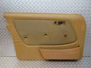 W123 front left door card palomino used OEM