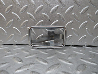 W123 chrome frame for door opener right used OEM
