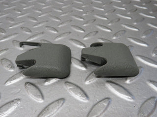 W124 front seat rail trim cover pair used OEM