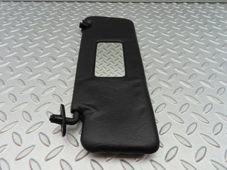 W124 Wagon sun visor left side black used OEM