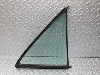 W124 rear left quarter window glass used OEM