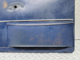 W109 front left door card blue used OEM