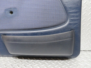 W123 front left door card blue used OEM