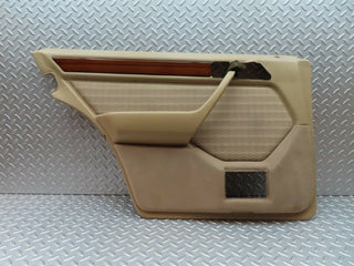 W124 rear left door card beige used OEM