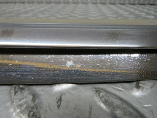 R107 SLC rear window trim left used OEM