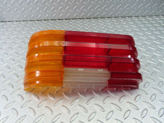 W114 rear left tail light lens used OEM