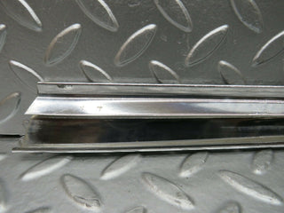 R107 SLC rear left window chrome trim used OEM