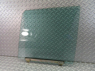 W115 front left door window glass used OEM