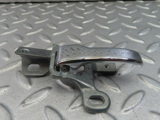 W123 left interior door handle used OEM