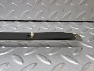 W109 left skirt chrome trim strip used OEM