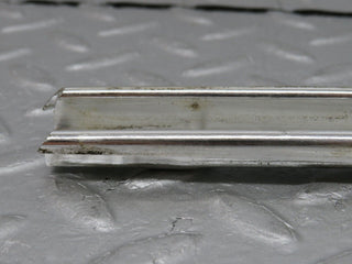 W108 rear right door chrome window channel used OEM