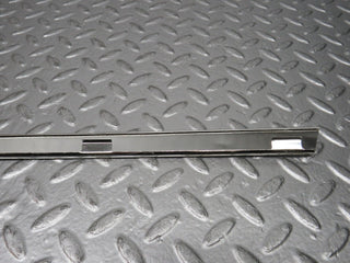 R107 SLC rear left window chrome used OEM