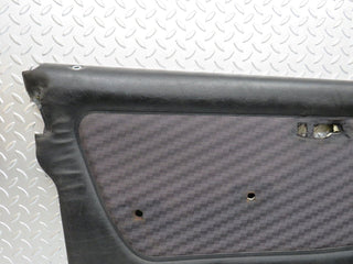 W123 front left door card black used OEM