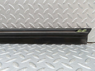 W123 front left door lower moulding trim used OEM
