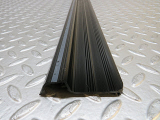 S123 Wagon front left door sill trim black used OEM