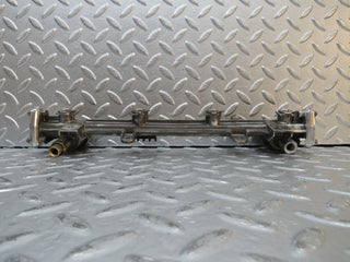 W124 Wagon fuel injector rail used OEM
