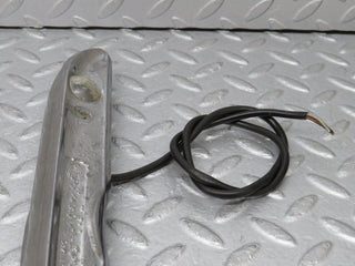 W108 number plate light trunk lid chrome used OEM
