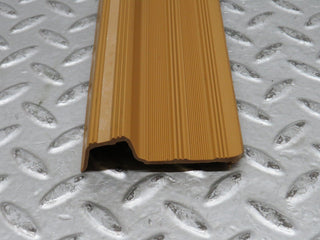 W123 rear left door sill trim palomino used OEM