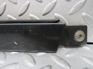 W124 Cabriolet under headlight trim left used OEM