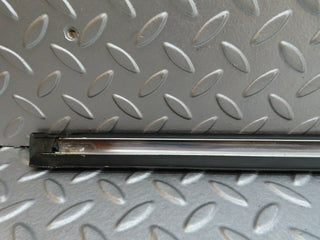 W123 front right door lower trim used OEM