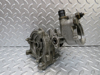 W124 water pump used OEM