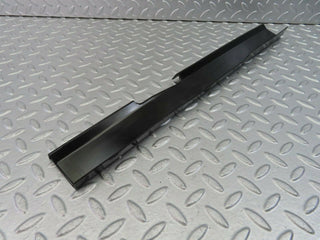 W123 Coupe cable channel cover front left used OEM