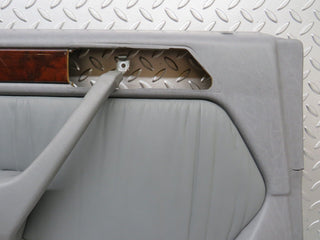 W124 rear left door card grey used OEM